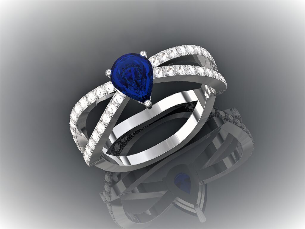 Bague Entrelacée en Or Blanc 18 Carats, Saphir Poire et Pavage Diamants
